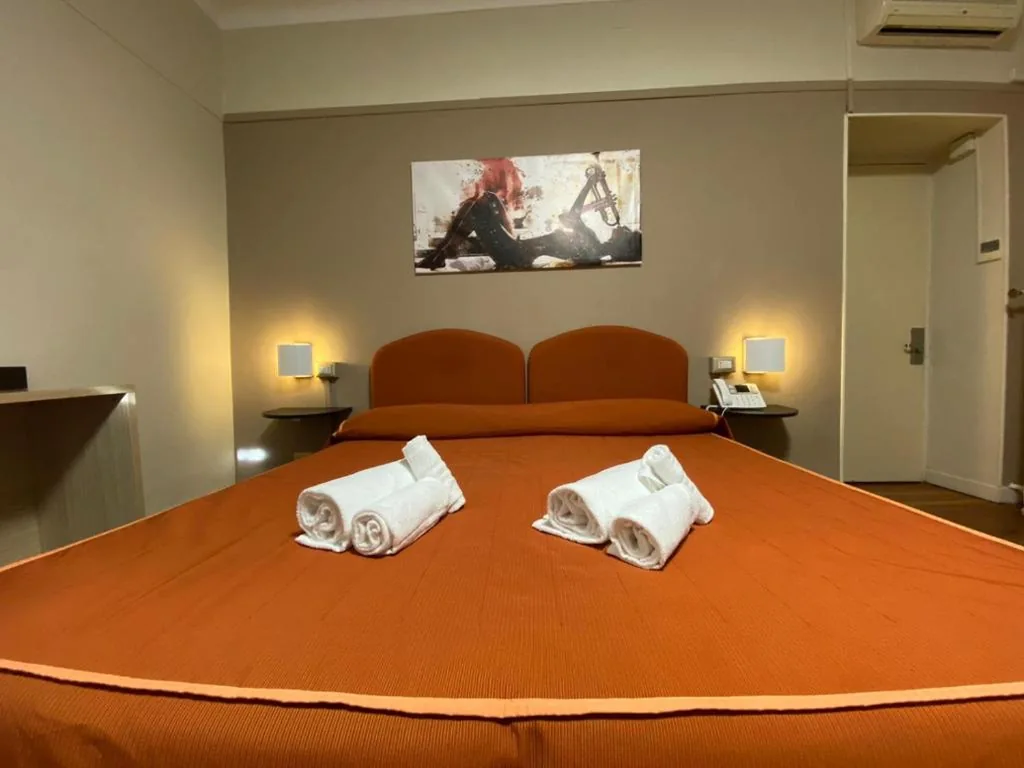 Quadruple Room — Hotel Morandi