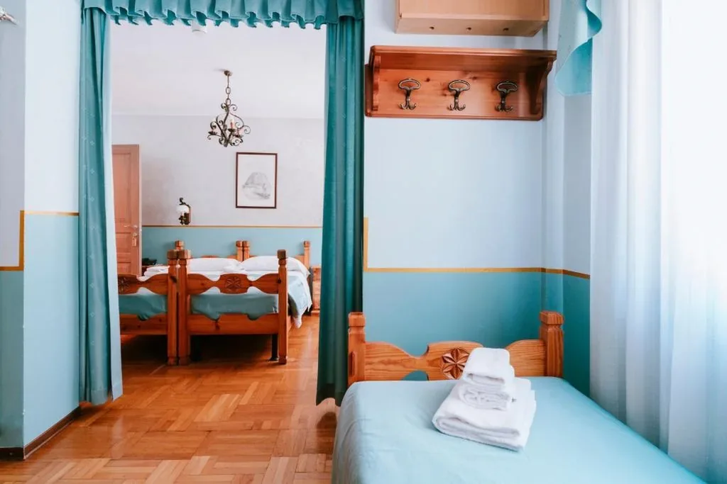 Quadruple Room — Hotel Napoleon
