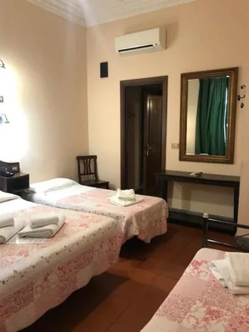 Quadruple Room — Hotel Panda