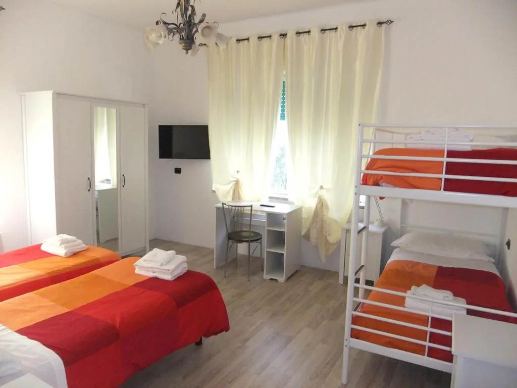 Quadruple Room — Hotel Paradise