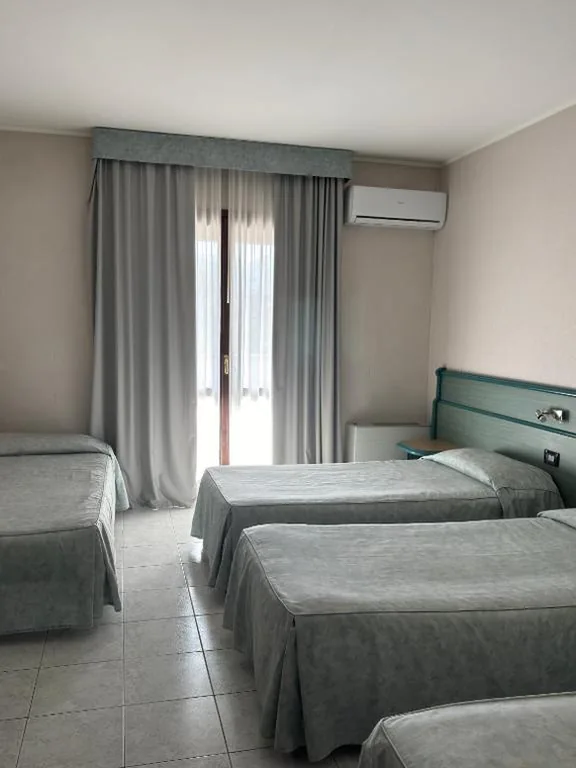 Camera Quadrupla — Hotel Pian del Sole