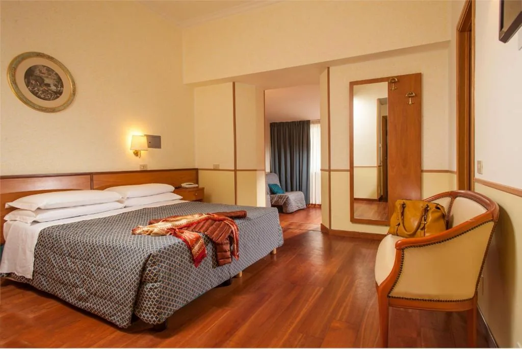 Quadruple Room — Hotel Piemonte
