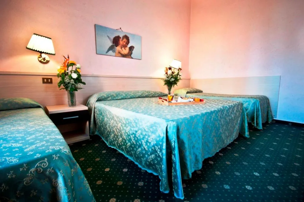 Quadruple Room — Hotel Priscilla