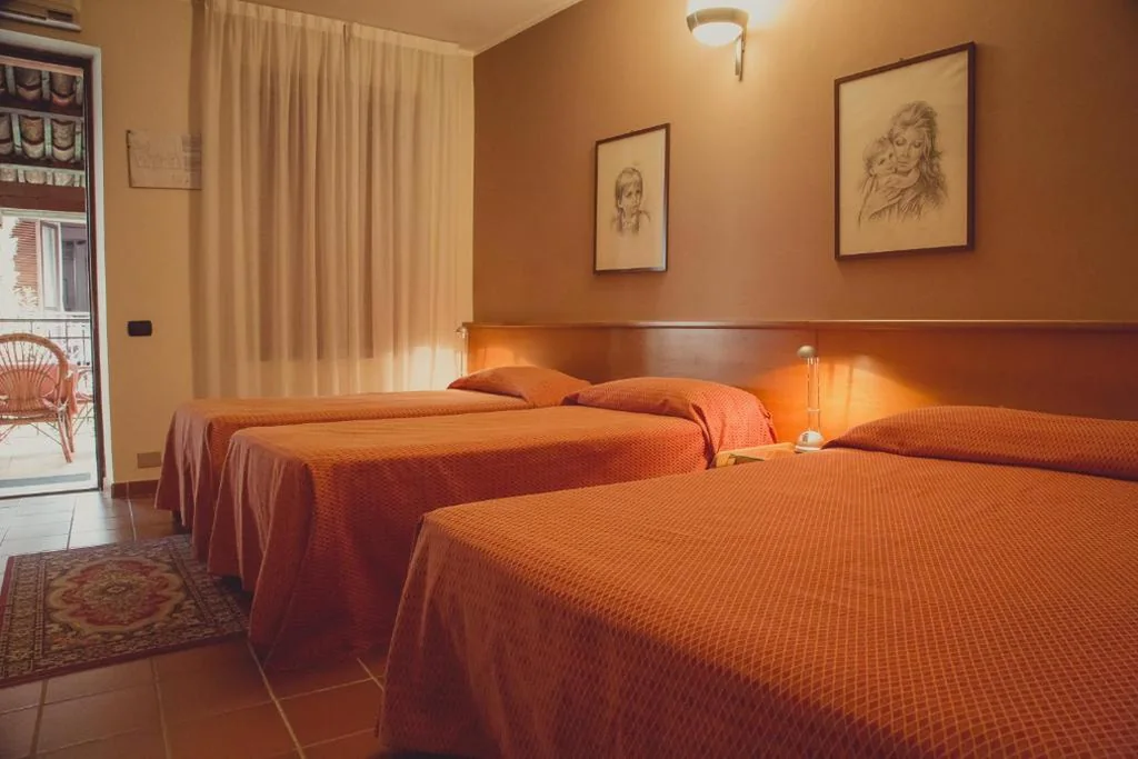 Quadruple Room — Hotel Rainero