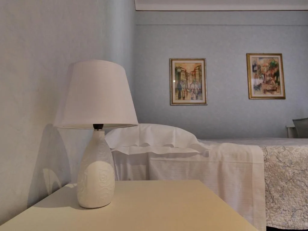 Quadruple Room — Hotel Residence Mondial