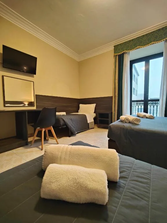Quadruple Room — Hotel Romano