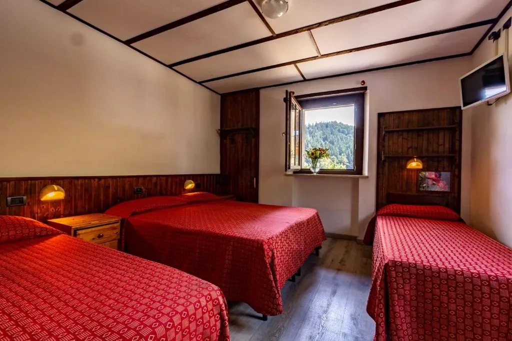 Quadruple Room — Hotel Saint Nicolas Gran Paradiso