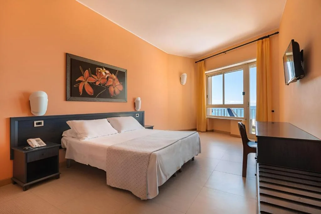 Quadruple Room — Hotel Serapo