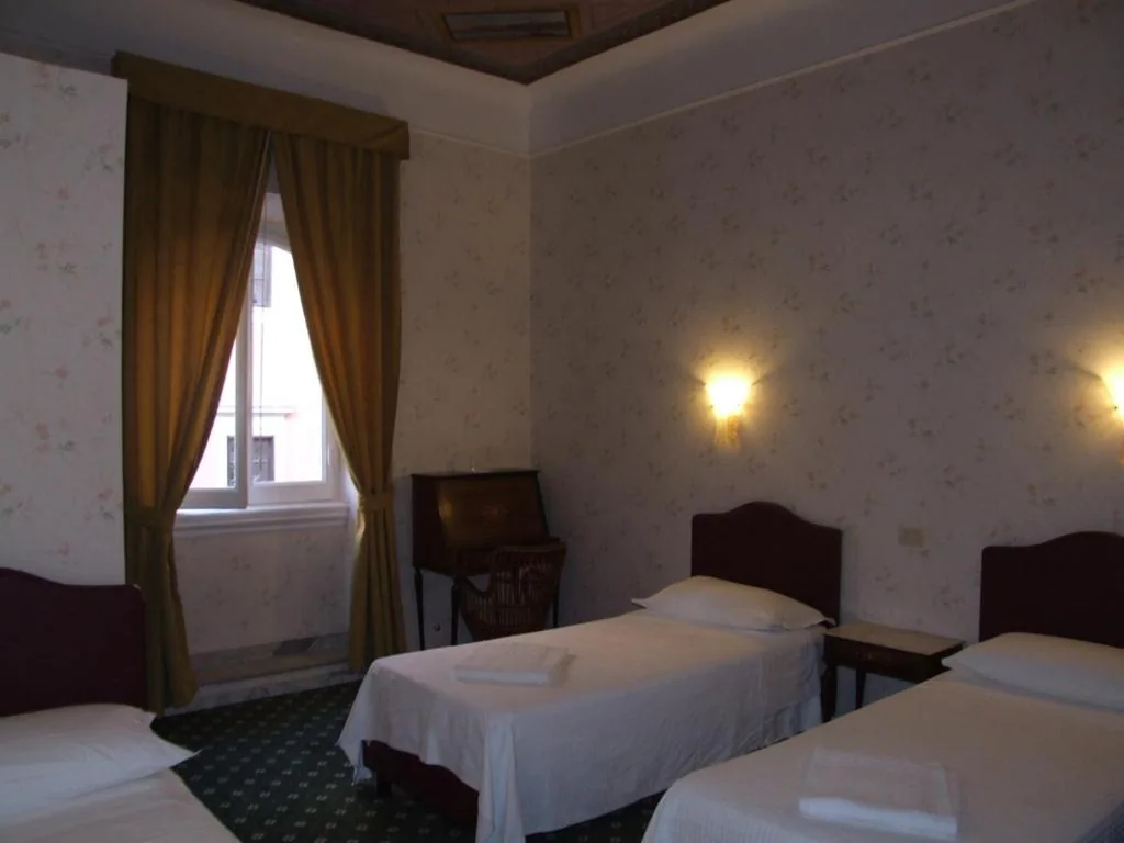 Quadruple Room — Hotel Texas
