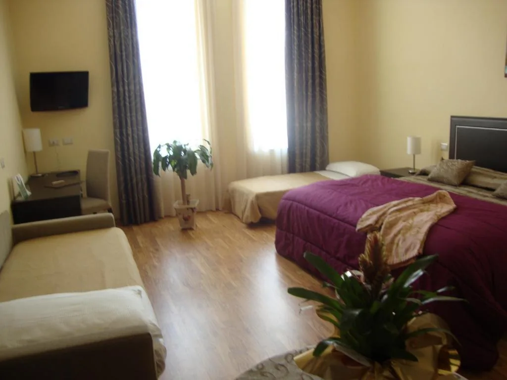 Quadruple Room — Hotel Villa Cinzia