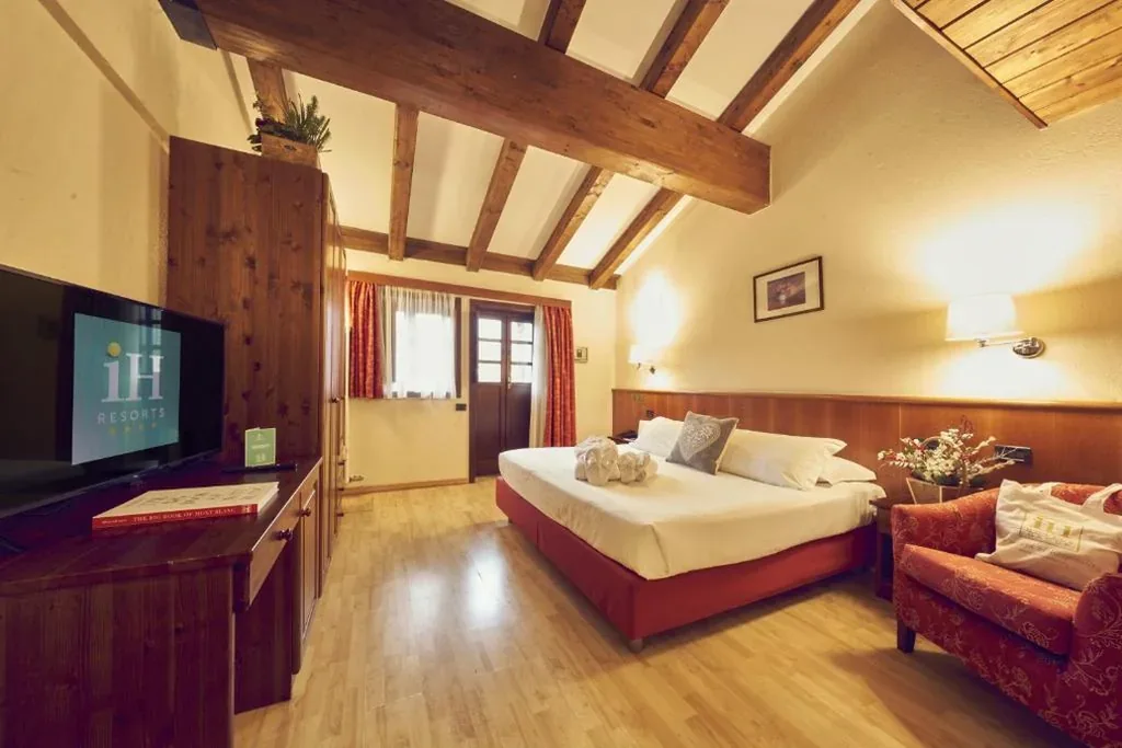Quadruple Room — iH Hotels Courmayeur Mont Blanc