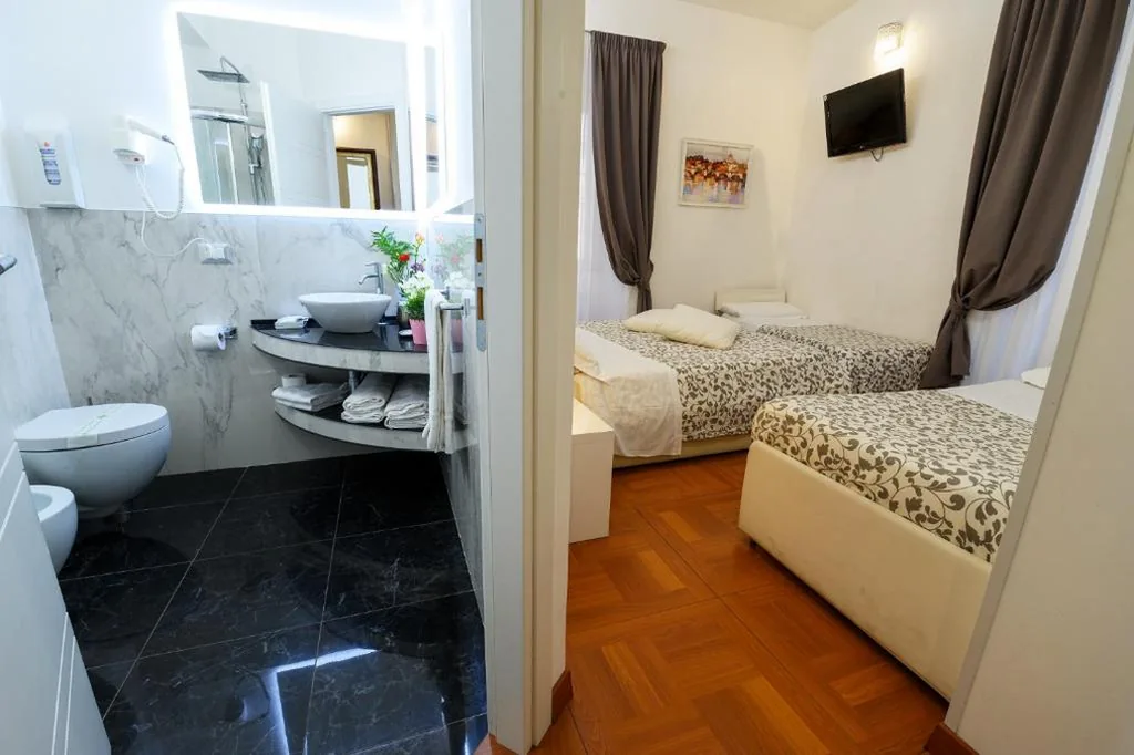Camera Quadrupla — Il Fascino Di Roma