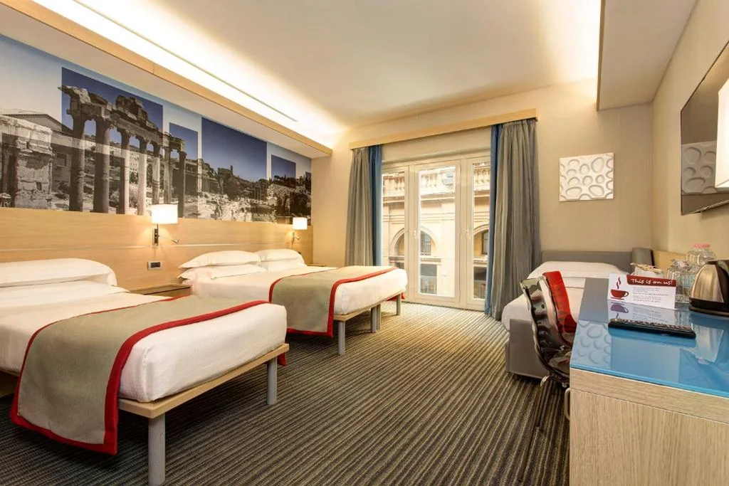 Quadruple Room — iQ Hotel Roma