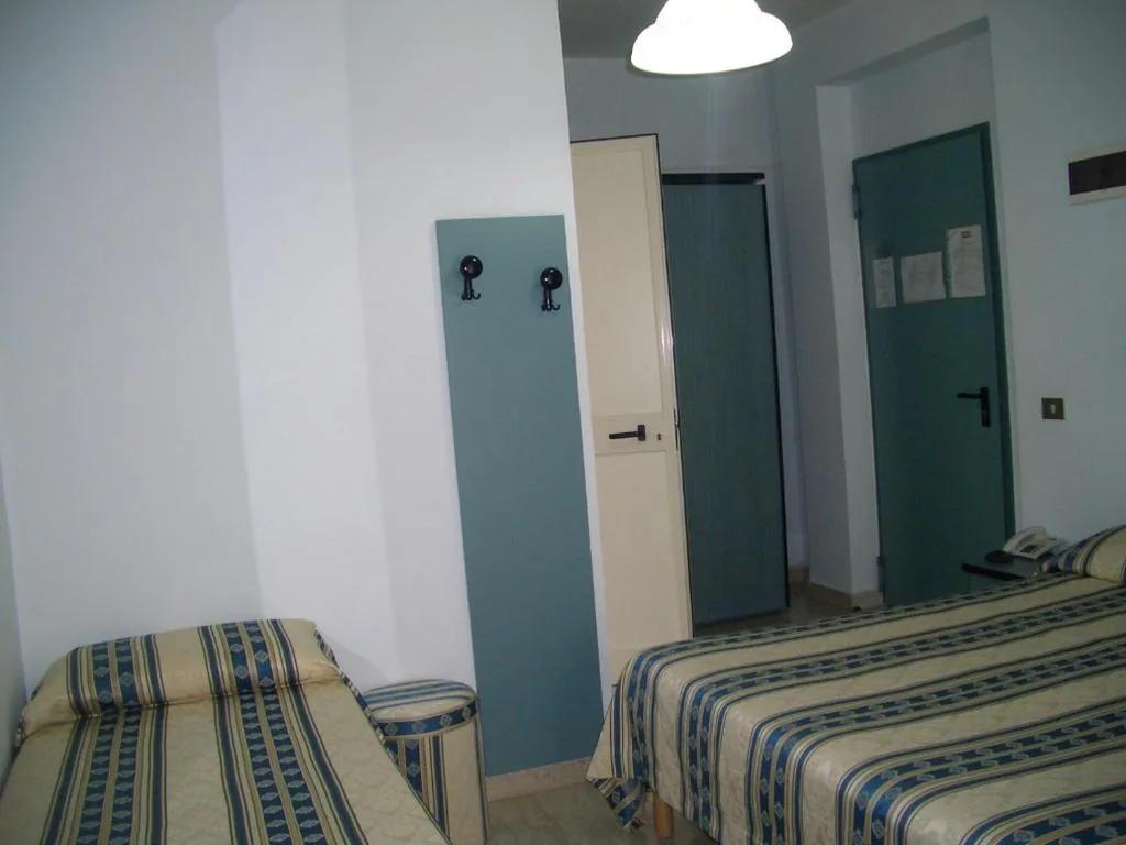 Camera Quadrupla — King Hotel