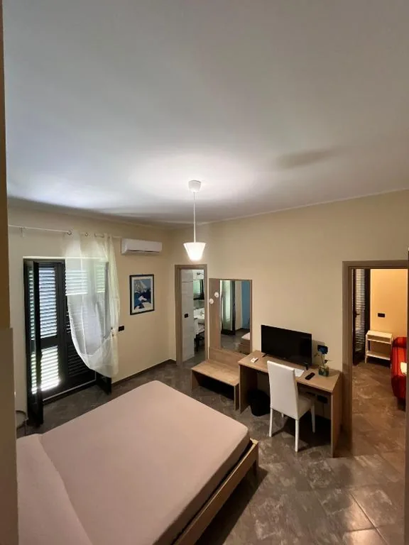 Camera Quadrupla — La Flacca Rooms
