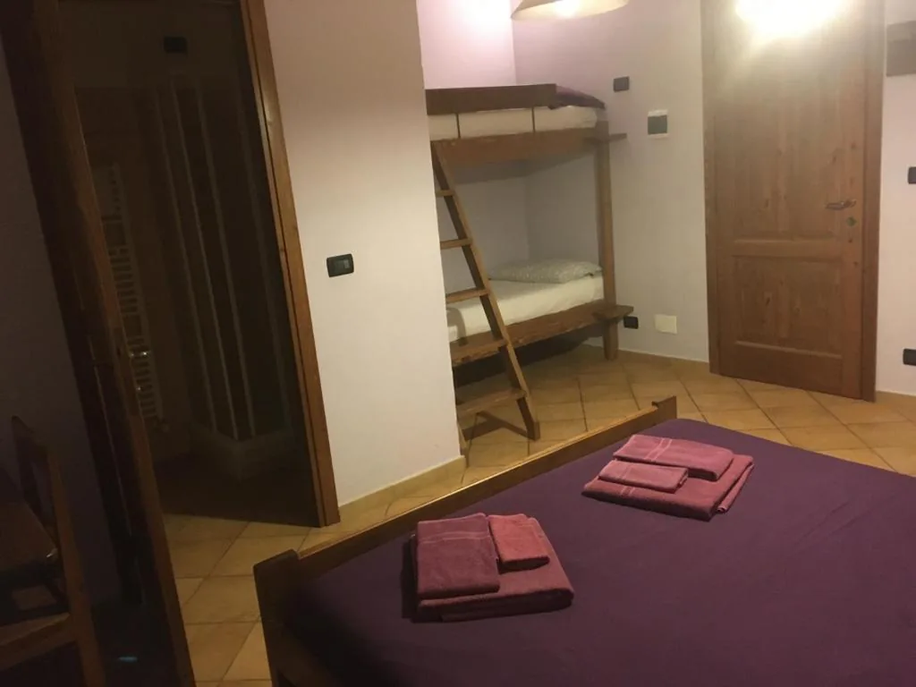 Quadruple Room — La Nuvola sul Mare