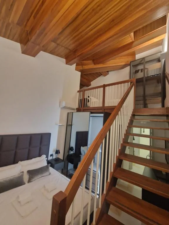 Luxury Quadruple Room — Corso Suite Style