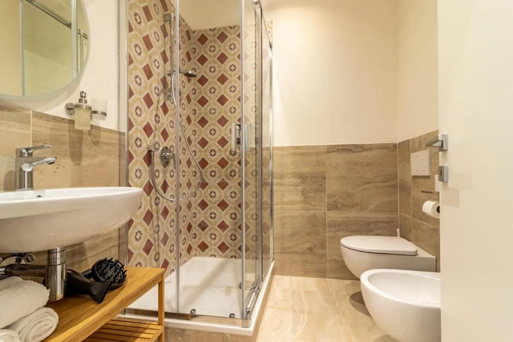 Camera Quadrupla Luxury — Oldoini Luxury Apartment and Suites – mytouristhome