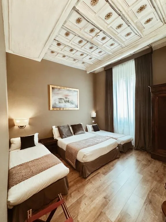Luxury Quadruple Room — Residenza Sciarra Suites