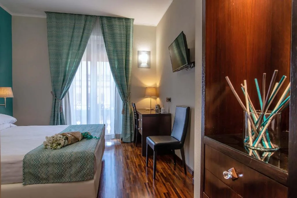Camera Quadrupla — Merulana Inn Guest House