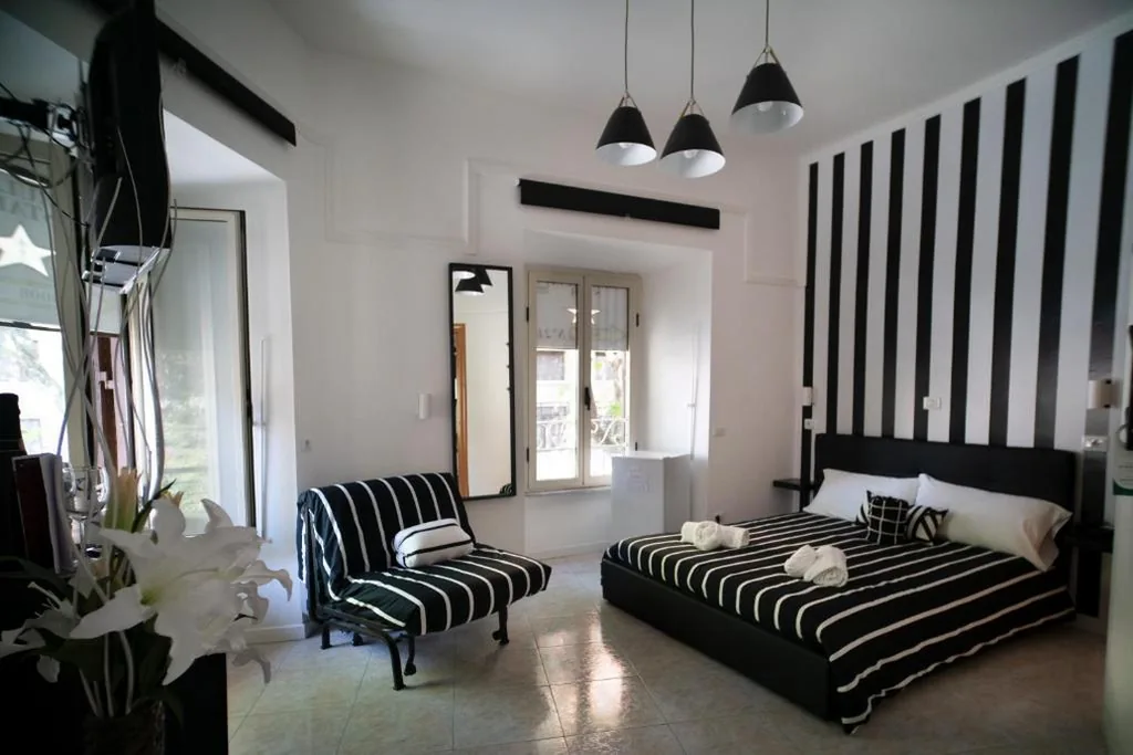 Quadruple Room — Merulana Star