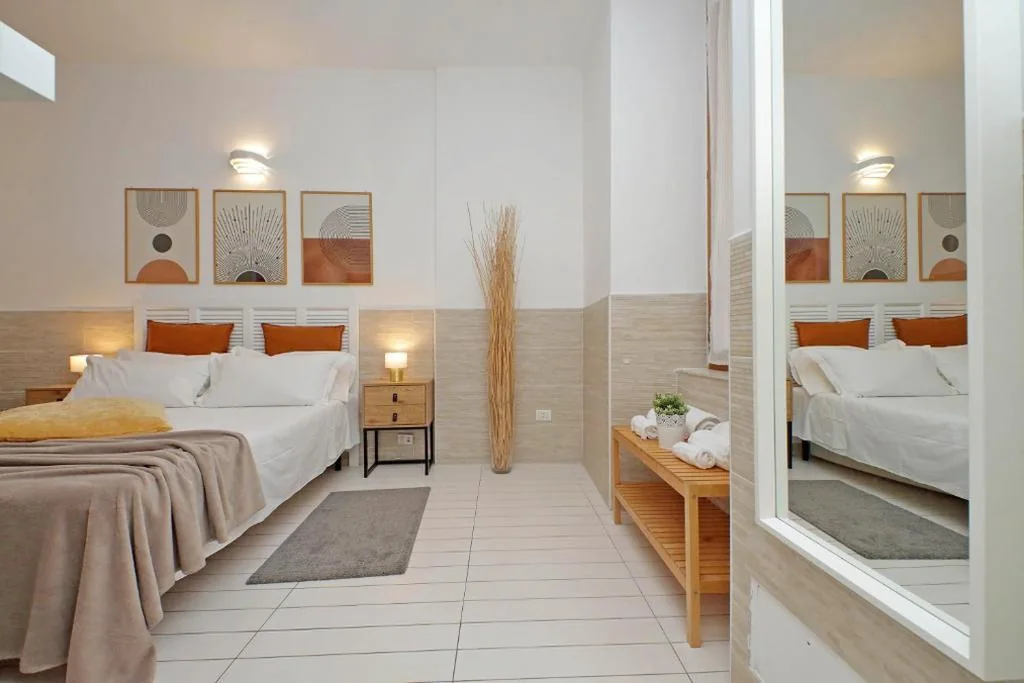 Quadruple Room — Opera Inn Suites – Rooms and Apartments