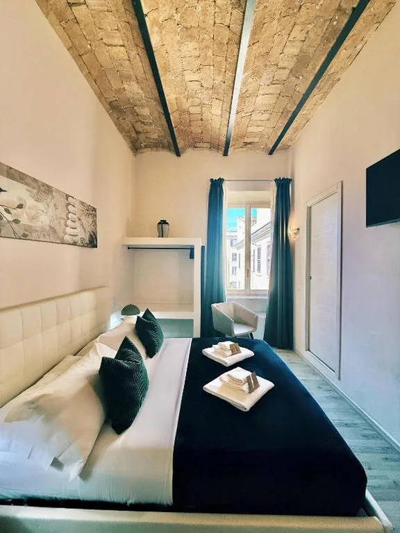 Camera Quadrupla Premium — San Pietro Rooms 84