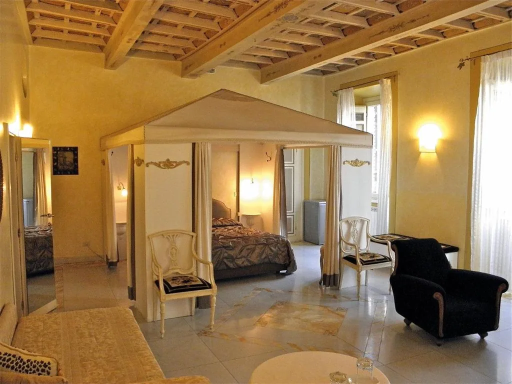 Camera Quadrupla — Residenza Al Corso Suites