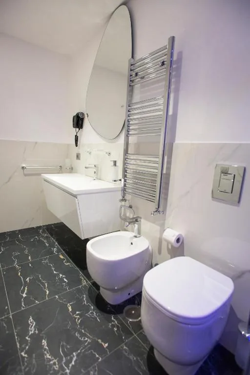 Quadruple Room — San Pietro Grand Suite