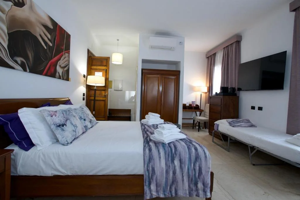 Quadruple Room — St. Peter’ Six Rooms & Suites