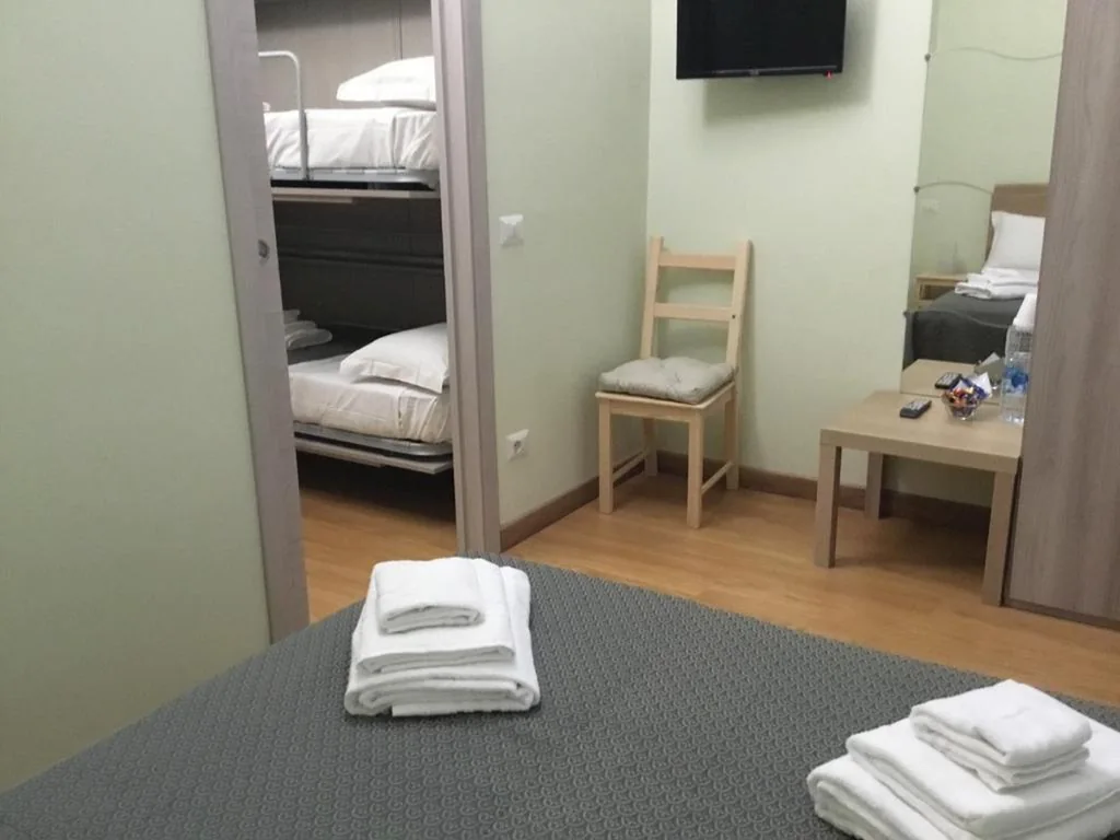 Standard Quadruple Room — Duca di Cavour