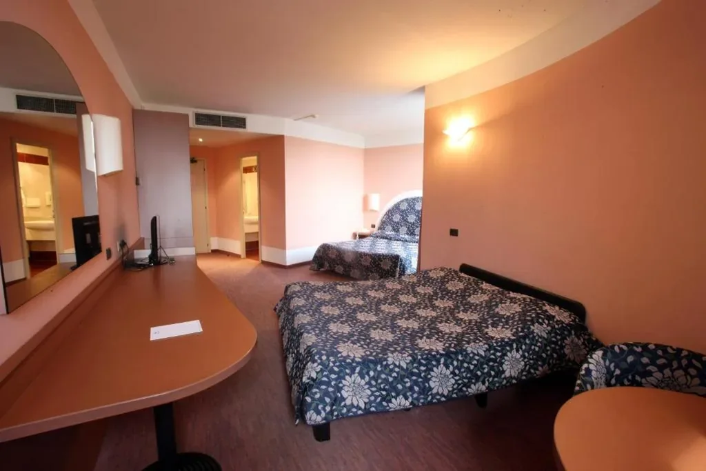 Standard Quadruple Room — Etoile Du Nord