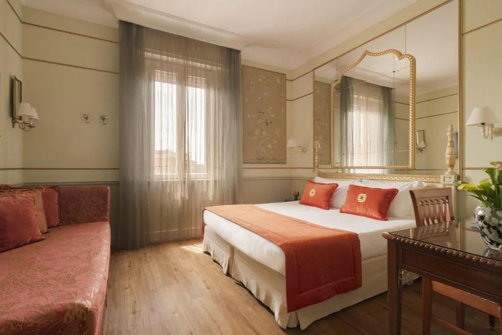 Camera Quadrupla Standard — Hotel Degli Aranci