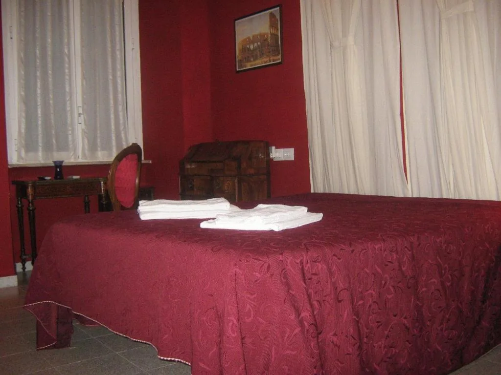 Standard Quadruple Room — Hotel Ferraro