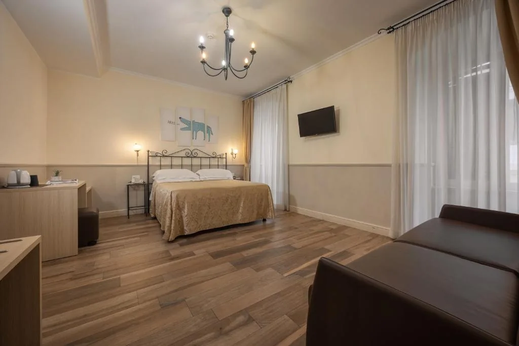 Standard Quadruple Room — Hotel Flavia