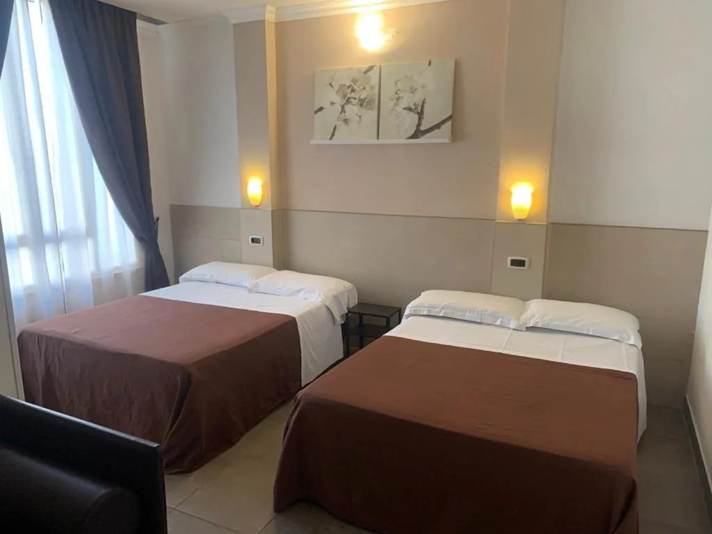 Camera Quadrupla Standard — Hotel Indipendenza
