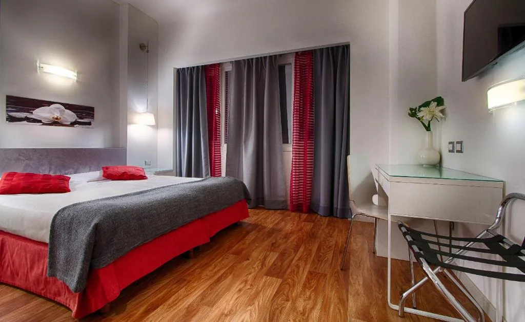 Standard Quadruple Room — Hotel Raganelli