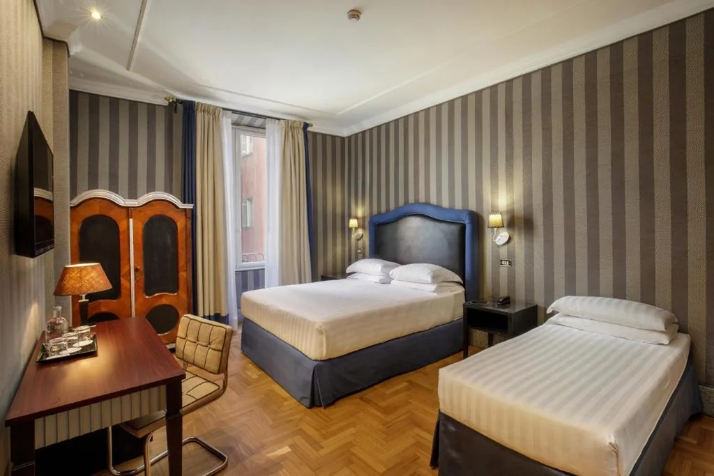 Standard Quadruple Room — Hotel Royal Court