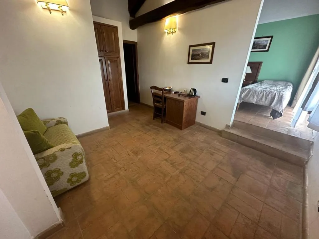 Standard Quadruple Room — Hotel Tenuta dell’Argento Resort