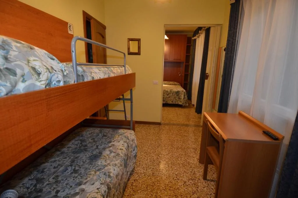Standard Quadruple Room — Hotel Villa Ruscello