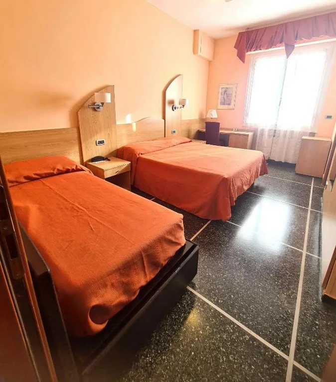 Standard Quadruple Room — Hotel Zurigo