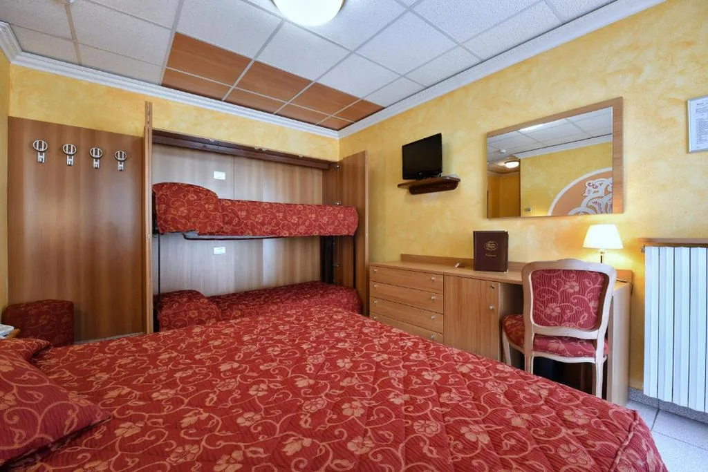 Quadruple Room — Stella Alpina Hotel e Ristorante