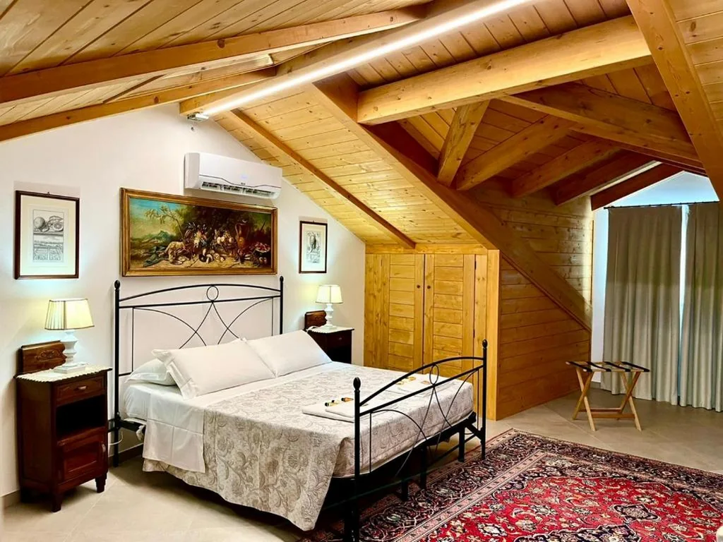 Superior Quadruple Room — Casa Marchisio