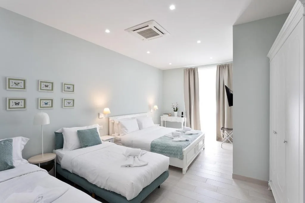 Superior Quadruple Room — Colosseo House