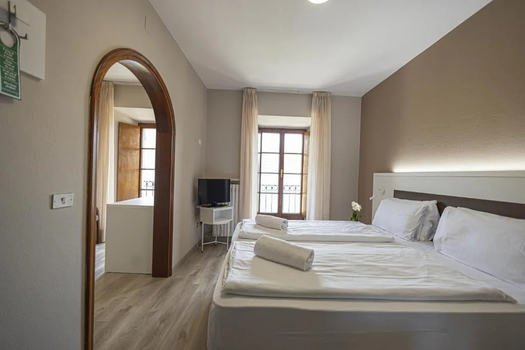 Superior Quadruple Room with Lake View — LVG Hotel Collection – Il Portico