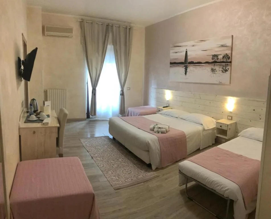 Camera Quadrupla Superior — Fiumicino Airport B&B Deluxe