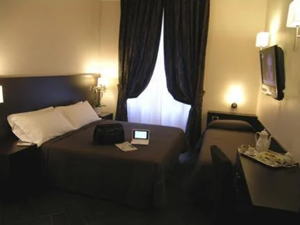 Camera Quadrupla Superior — Florida rooms – comfort Hotel
