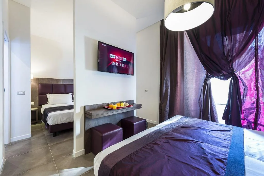 Superior Quadruple Room — Hotel California