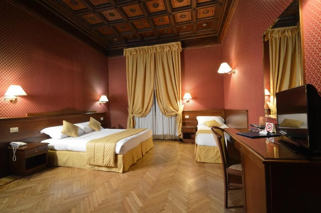 Camera Quadrupla Superior — Hotel Montecarlo