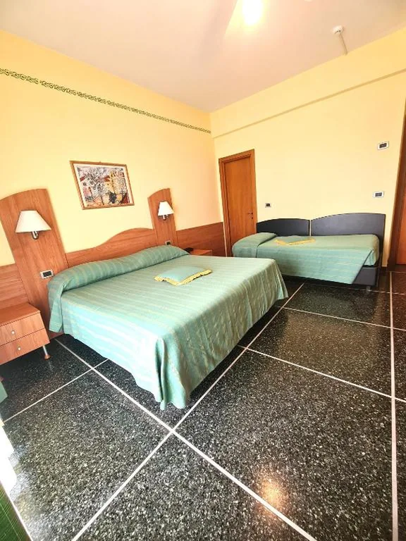 Superior Quadruple Room — Hotel Zurigo